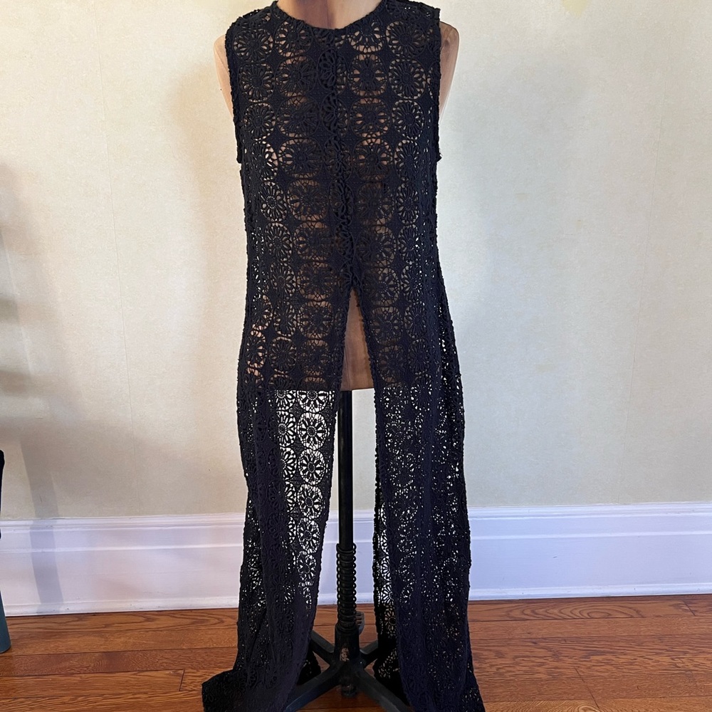 Crocheted, floor-length overlay with front and
back slits